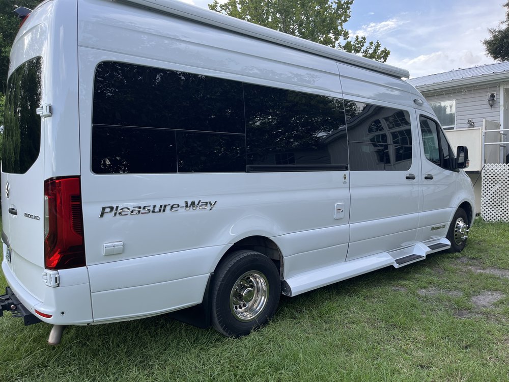 White Sprinter van with tinted side windows