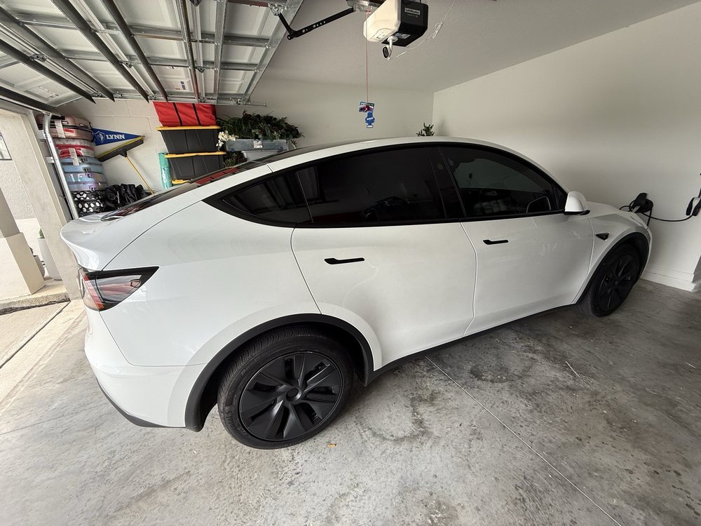 White Tesla with dark window tint